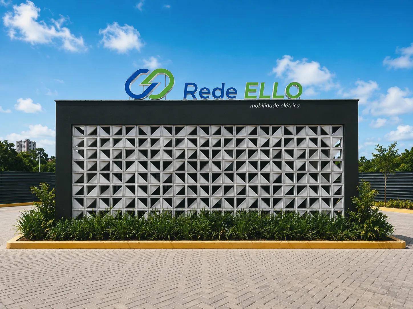 Fachada de entrada do Hub Premium Rede Ello, com sinalização e muro vazado, em Farolândia, Aracaju